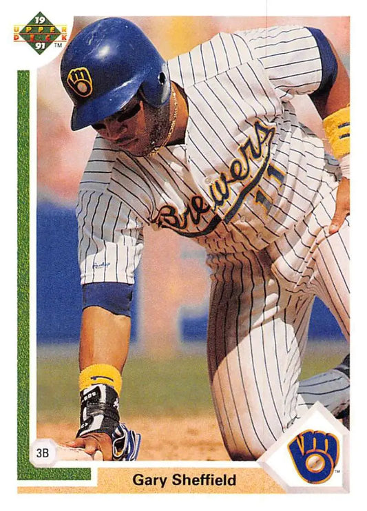 Gary Sheffield swinging bat in pinstriped uniform on 1991 Upper Deck baseball card