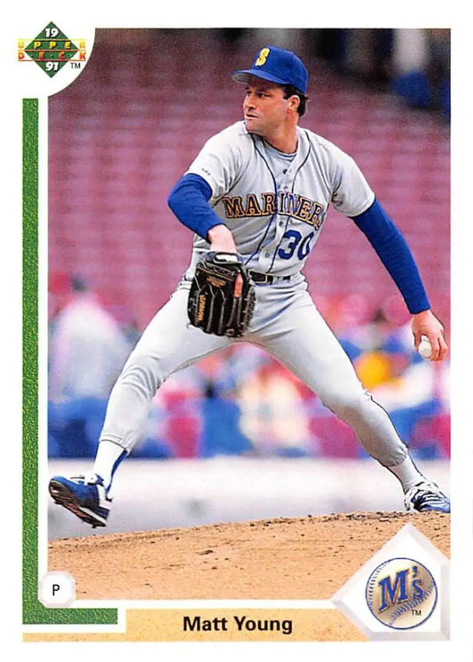 Matt Young delivering a pitch for the Seattle Mariners in his road uniform
