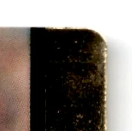 Roughly textured dark brown wallet corner with action packed football rookie update theme