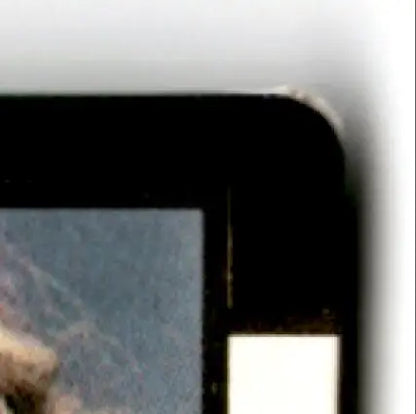 Top right corner of a dark electronic device on the 1992 Action Packed Football Rookie Jeff George #74 Indianapolis Colts card