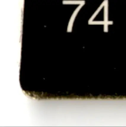 Black rectangular football rookie update card with number 74 for 1992 Action Packed Football