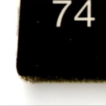 Black rectangular football rookie update card with number 74 for 1992 Action Packed Football