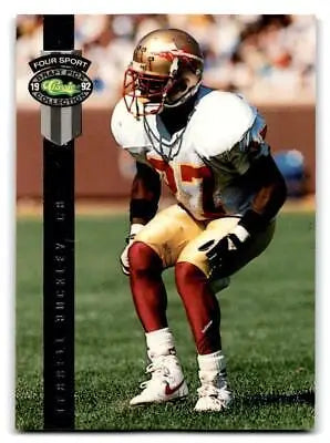 Football player in stance from 1992 Classic Four Sport BC15 Terrell Buckley cards