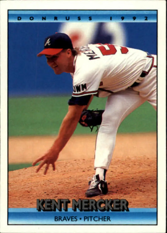 Baseball pitcher in white Atlanta Braves uniform delivering, featured on Kent Mercker baseball card