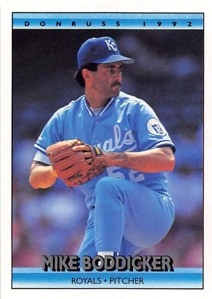 Mike Boddicker pitching in a light blue Kansas City Royals uniform on a baseball card