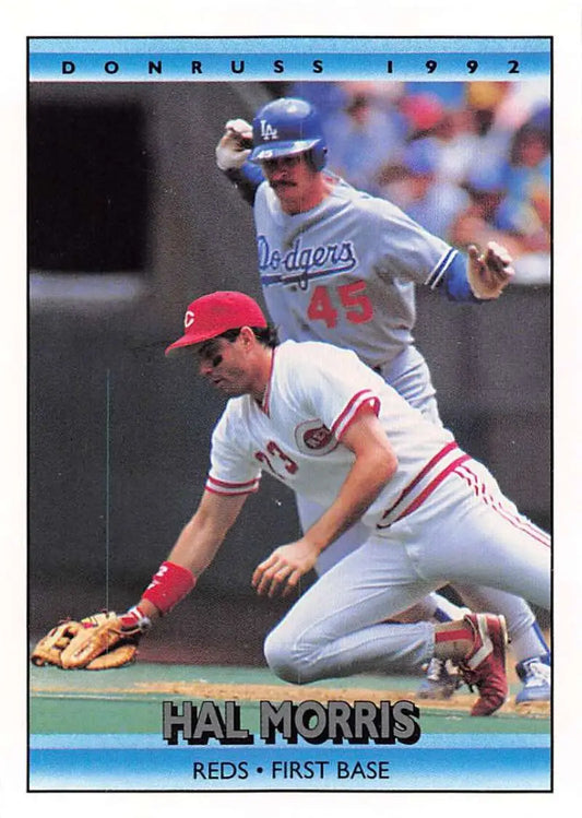 1992 Donruss Hal Morris baseball card featuring Cincinnati Reds first baseman in action