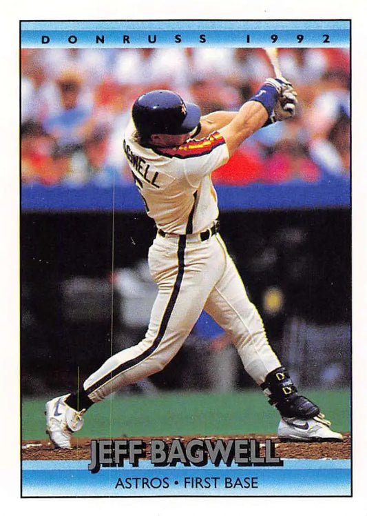 1992 Donruss #358 Jeff Bagwell mid-swing Houston Astros baseball card in NM-MT condition