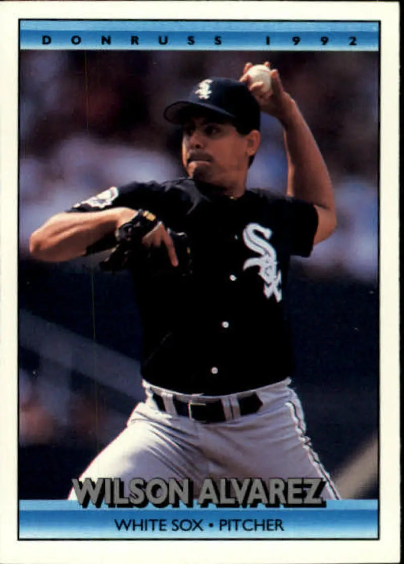Baseball pitcher Wilson Alvarez delivering in Chicago White Sox uniform on card