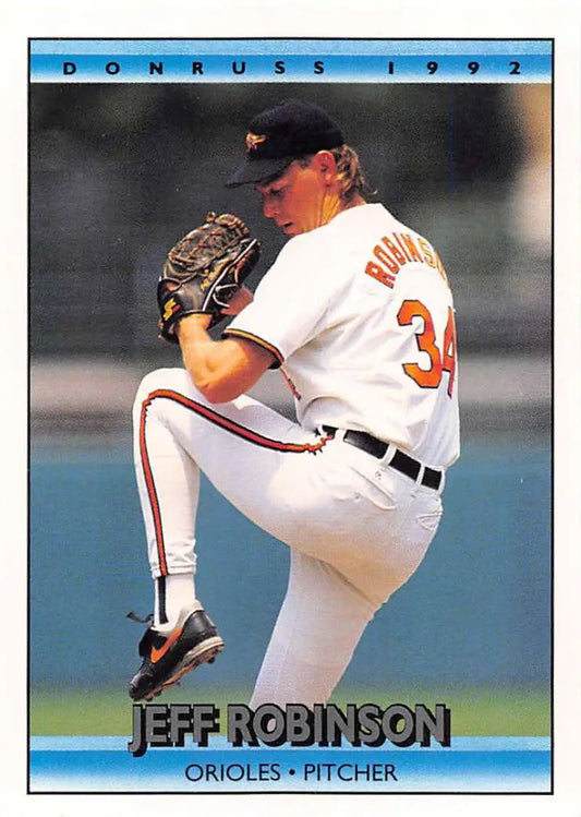 1992 Donruss baseball card of Jeff Robinson, Baltimore Orioles pitcher in windup