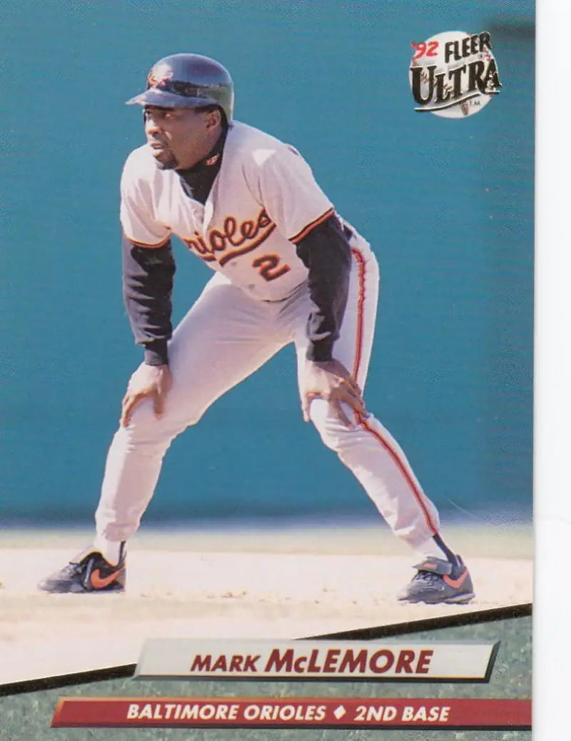 Baseball card of Mark McLemore in a white uniform for Baltimore Orioles at second base