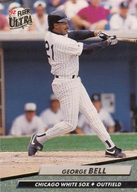 Baseball player in Chicago White Sox uniform swinging bat on George Bell card