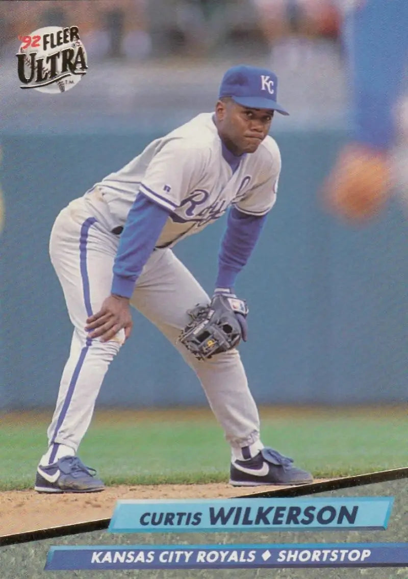 Baseball player in Kansas City Royals uniform in fielding stance for Fleer Ultra card