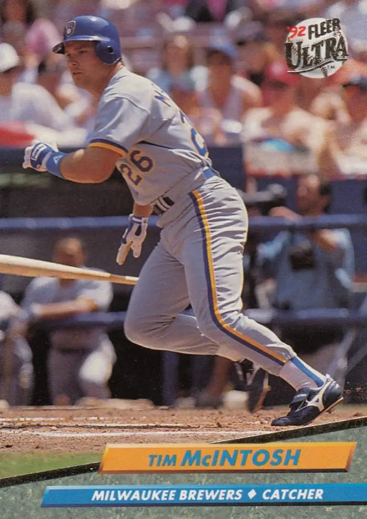 Tim McIntosh swinging bat in Milwaukee Brewers uniform on baseball card image
