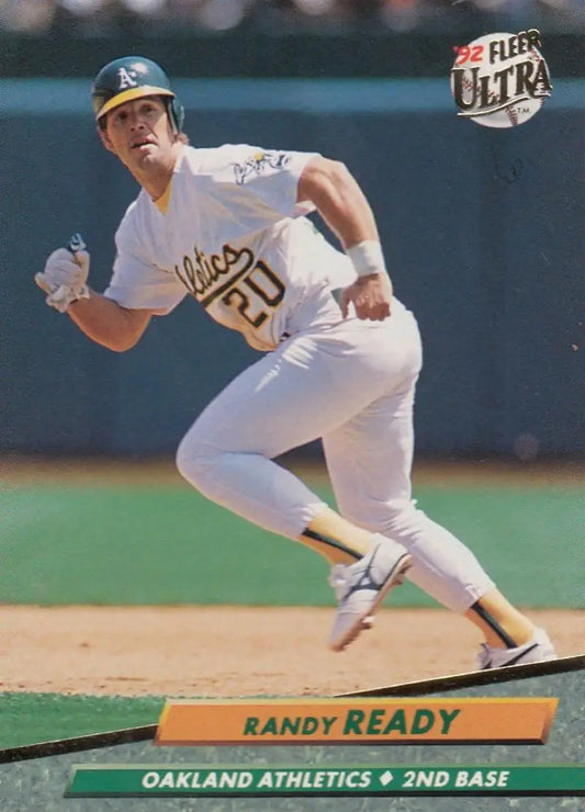 Randy Ready of the Oakland Athletics running on the field, featured in a baseball card