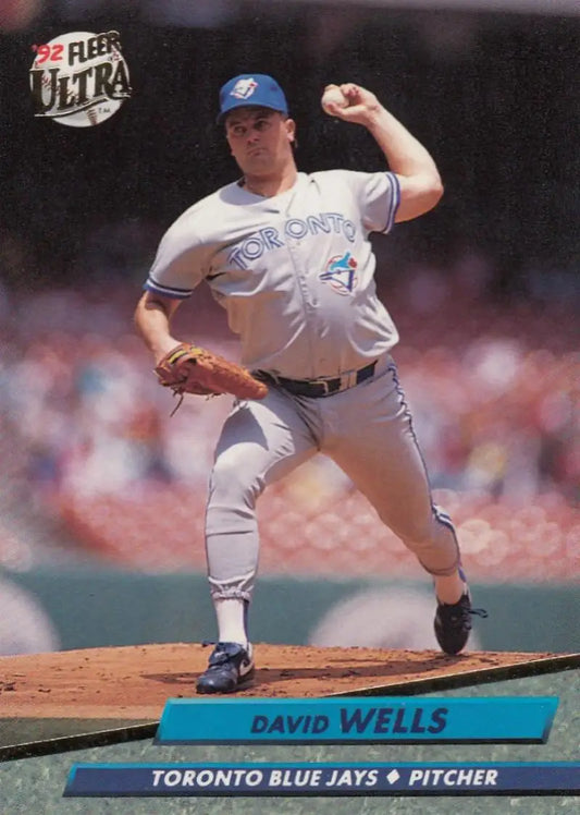 David Wells in mid-throwing motion for the Blue Jays on a baseball card
