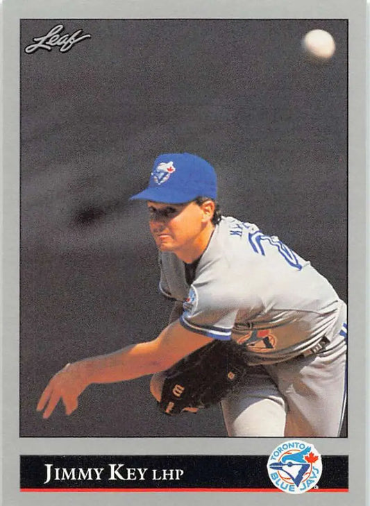 Baseball card of Jimmy Key pitching for the Toronto Blue Jays in 1992 Leaf design