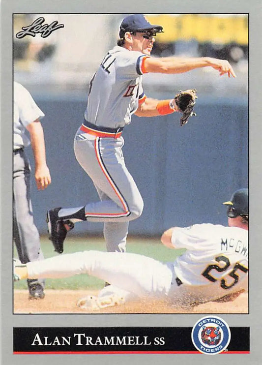 Alan Trammell leaps over a baserunner on this Detroit Tigers baseball card