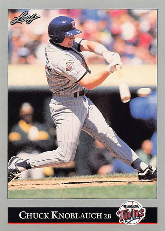Chuck Knoblauch swinging a bat in Minnesota Twins uniform on baseball card image
