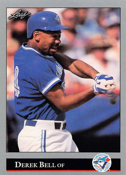 Baseball player Derek Bell in Toronto Blue Jays uniform swinging bat on trading card