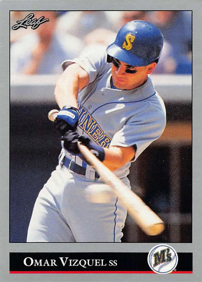 Omar Vizquel swinging a bat in Seattle Mariners uniform on a baseball card