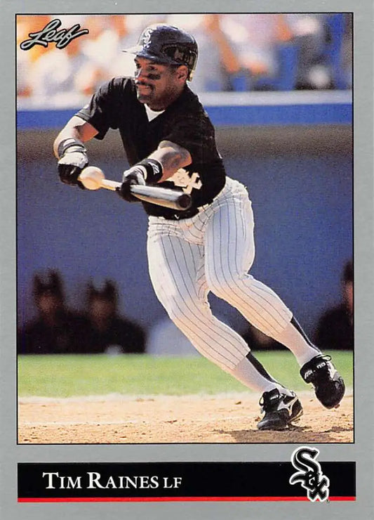 Baseball player swinging a bat in Chicago White Sox pinstriped uniform