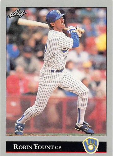 Robin Yount mid-swing in pinstripe uniform on a Milwaukee Brewers baseball card