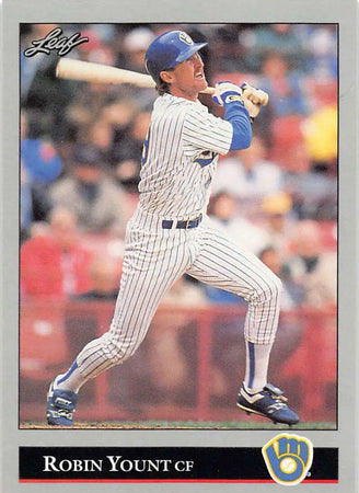 Robin Yount mid-swing in pinstripe uniform on a Milwaukee Brewers baseball card