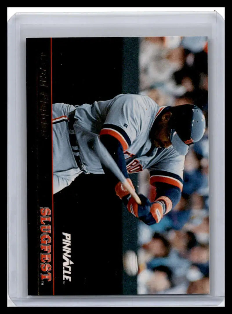 Baseball player in gray uniform sliding into base, highlighting Cecil Fielder NM-MT card