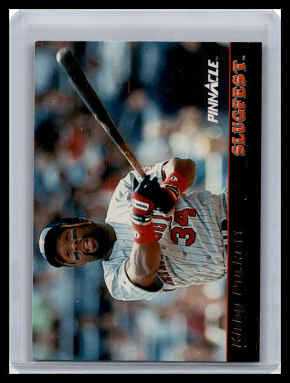 Baseball card of Kirby Puckett swinging for the Minnesota Twins in white uniform