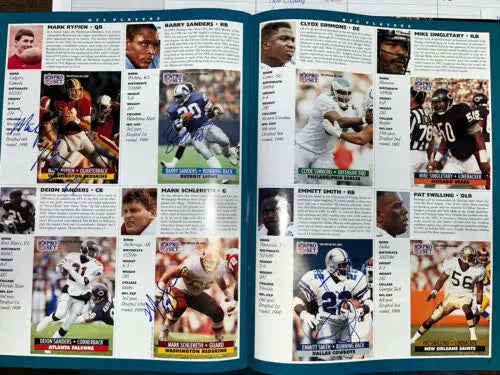 Autographed football trading cards featuring Emmitt Smith Barry Sanders Pro Bowl signatures