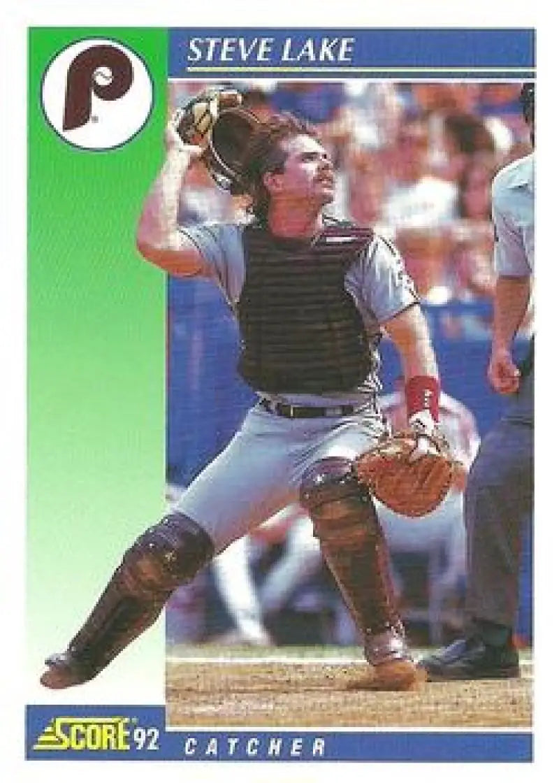 Baseball card of Steve Lake in throwing motion with Philadelphia Phillies gear