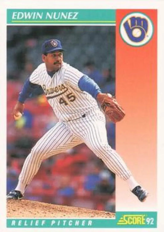Baseball player Edwin Nunez in Milwaukee Brewers uniform pitching on baseball card
