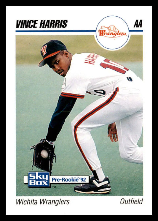 Baseball card of Vince Harris, Wichita Wranglers outfielder in fielding action