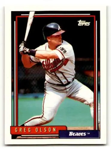 Baseball card of Greg Olson Atlanta Braves in white uniform with original gloss