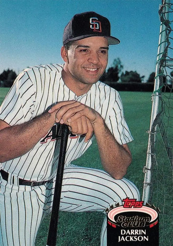 Darrin Jackson in San Diego Padres pinstriped uniform with bat ready to hit