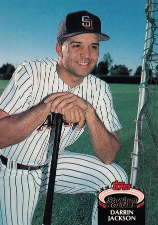 Darrin Jackson in San Diego Padres pinstriped uniform with bat ready to hit