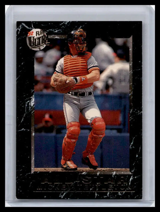 Baseball catcher in gray and red gear, representing Mickey Tettleton of Detroit Tigers
