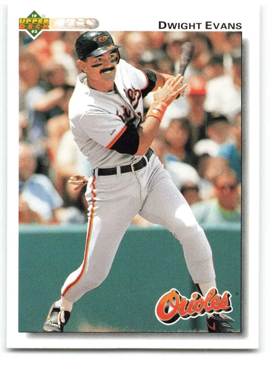 Baseball player Dwight Evans in Baltimore Orioles uniform swinging bat for Upper Deck card