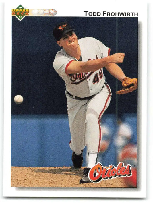 Todd Frohwirth pitching in a Baltimore Orioles uniform on a baseball card
