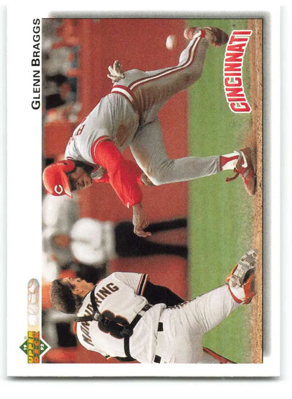 Glenn Braggs sliding into base in a thrilling play, captured on his Upper Deck baseball card