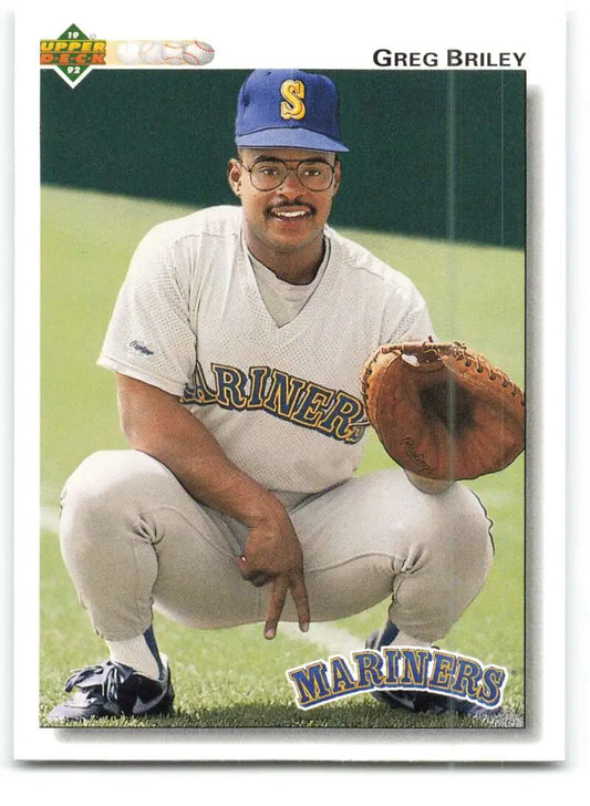 Greg Briley in Seattle Mariners uniform crouching with a glove on baseball card