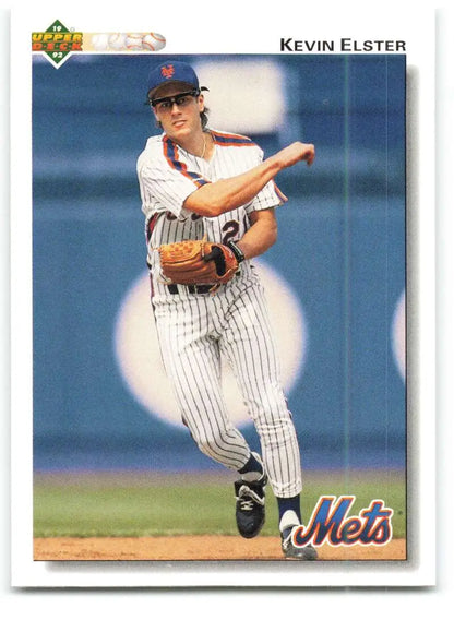Kevin Elster making a throw in pinstriped uniform New York Mets baseball card