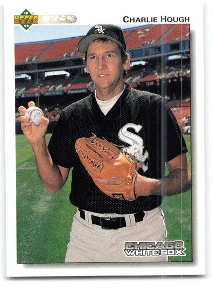 Chicago White Sox player Charlie Hough holding a baseball and glove, 1992 card