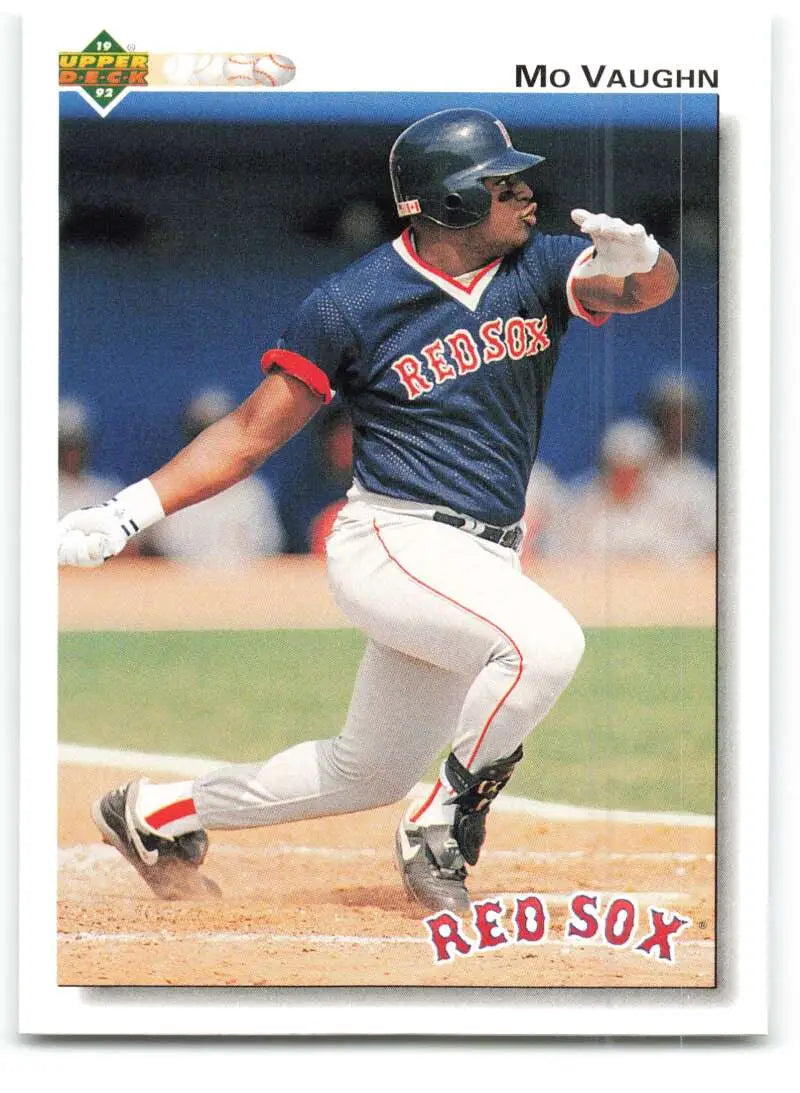 Baseball player in Boston Red Sox uniform swinging bat for Upper Deck card