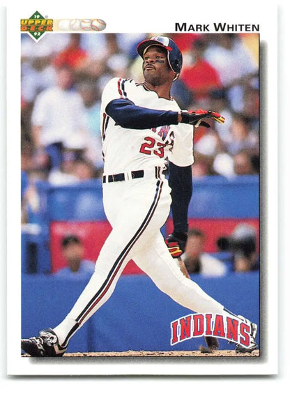 Cleveland Indians Baseball Card of Mark Whiten in white uniform swinging bat