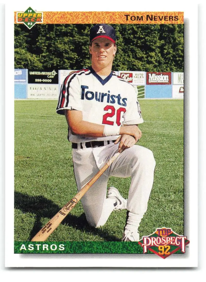 Baseball player Tom Nevers kneeling with bat in Asheville Tourists uniform for Upper Deck card
