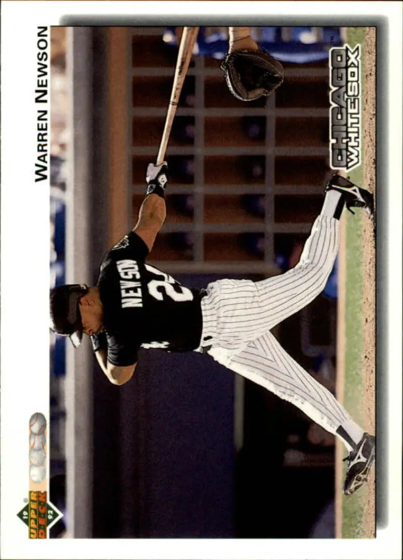 Warren Newson swinging bat in Chicago White Sox pinstriped uniform image