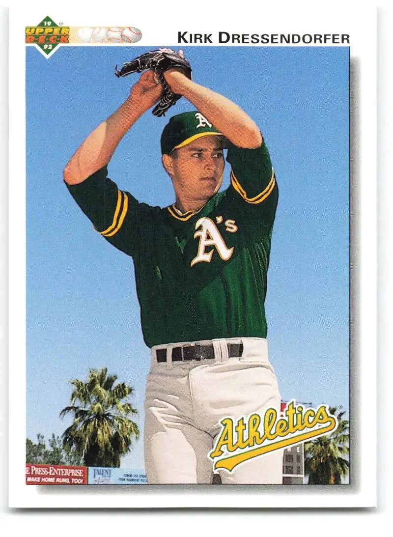 Baseball card of Kirk Dressendorfer in wind-up pose for Oakland Athletics jersey