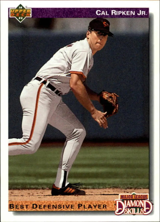 Baseball card of Cal Ripken Jr. in a fielding stance for the Baltimore Orioles