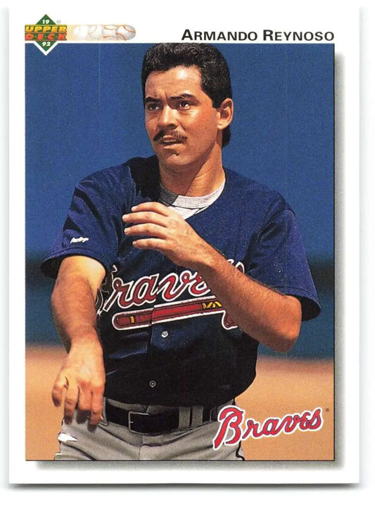 Baseball card of Armando Reynoso in navy uniform, Atlanta Braves 1992 Upper Deck #674